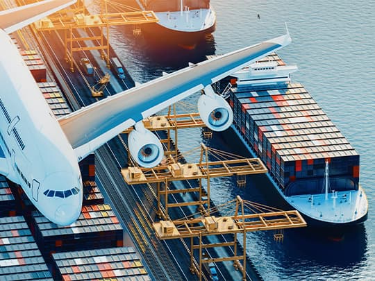 airplane and ship at port